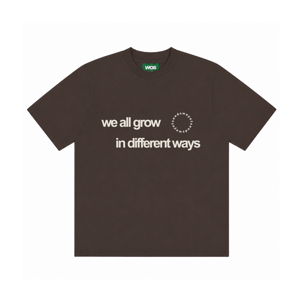 WE ALL GROW IN DIFFERENT WAYS TEE