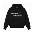 WE ALL GROW IN DIFFERENT WAYS HOODIE